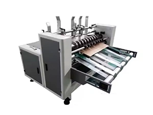 Máquina para fabricar separadores de cajas