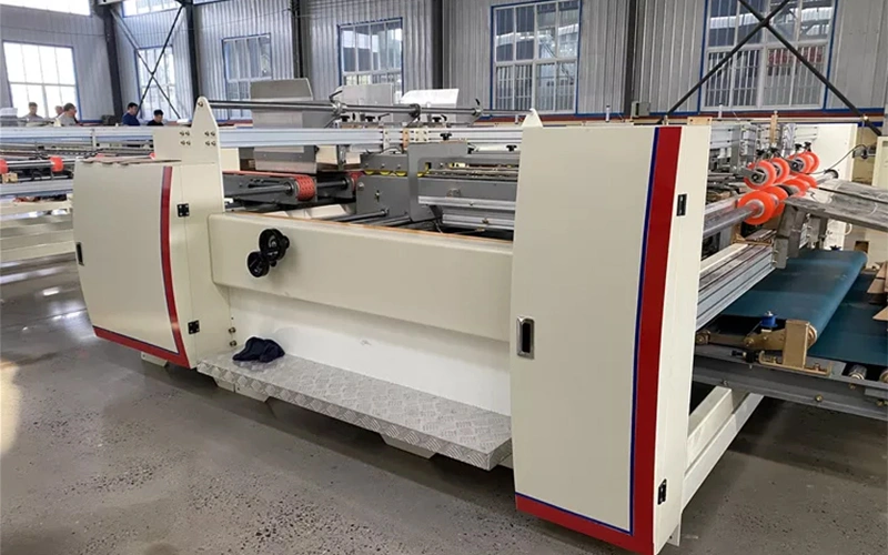 Plegadora encoladora semiautomática para cajas de dos piezas