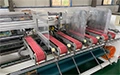 Plegadora encoladora semiautomática para cajas de dos piezas