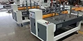 Máquina cortadora y ranuradora para separadores de cartón