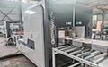 Máquina flejadora para cartón corrugado