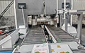 Máquina flejadora para cartón corrugado